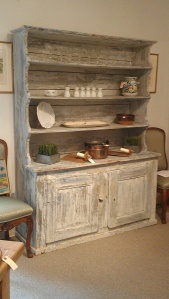 This hutch is new, but I love the color and its aged look.